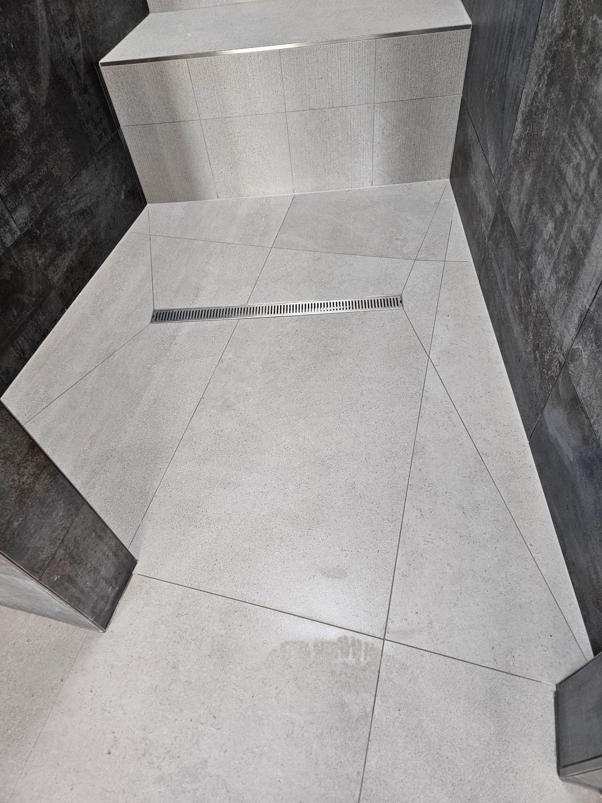 Curbless entry, linear drain